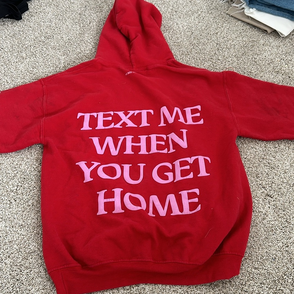 a sweatshirt from a brand called lonely ghost